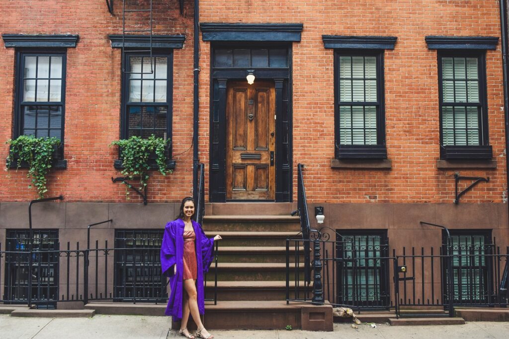 NYU student in gown